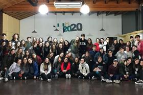 Group of people celebrating on stage