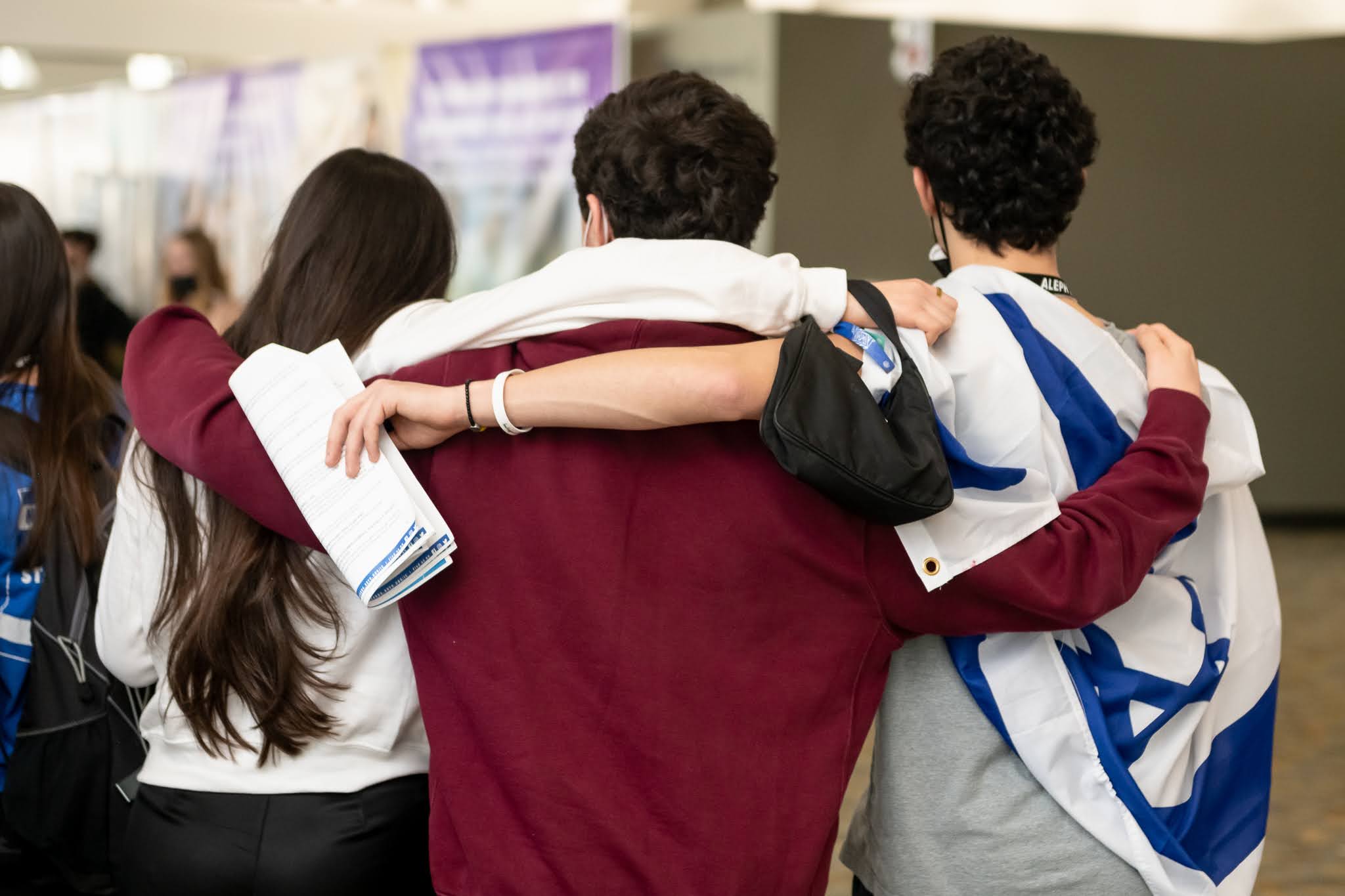 Group of people celebrating on stage