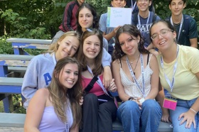 Group of people celebrating on stage