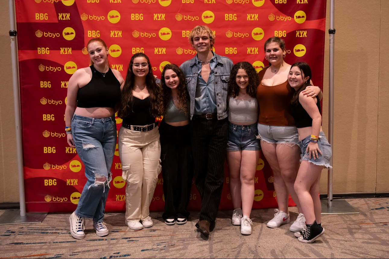 Group of people celebrating on stage