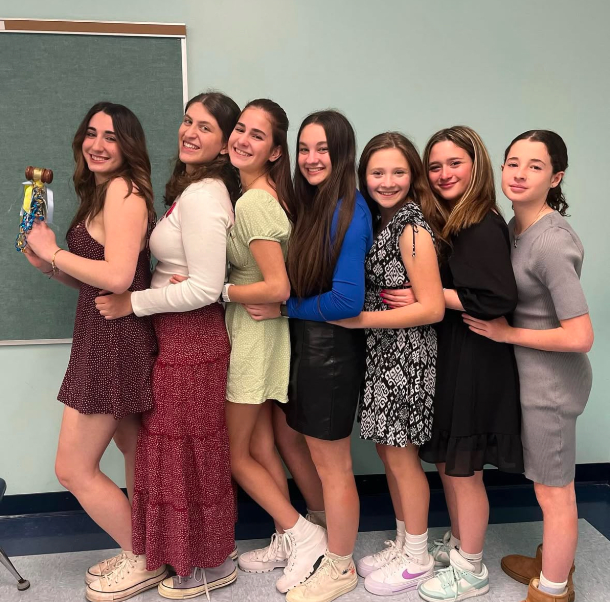 Group of people celebrating on stage