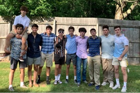 Group of people celebrating on stage