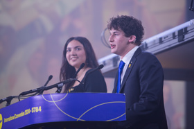 Group of people celebrating on stage