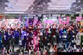 Group of people celebrating on stage