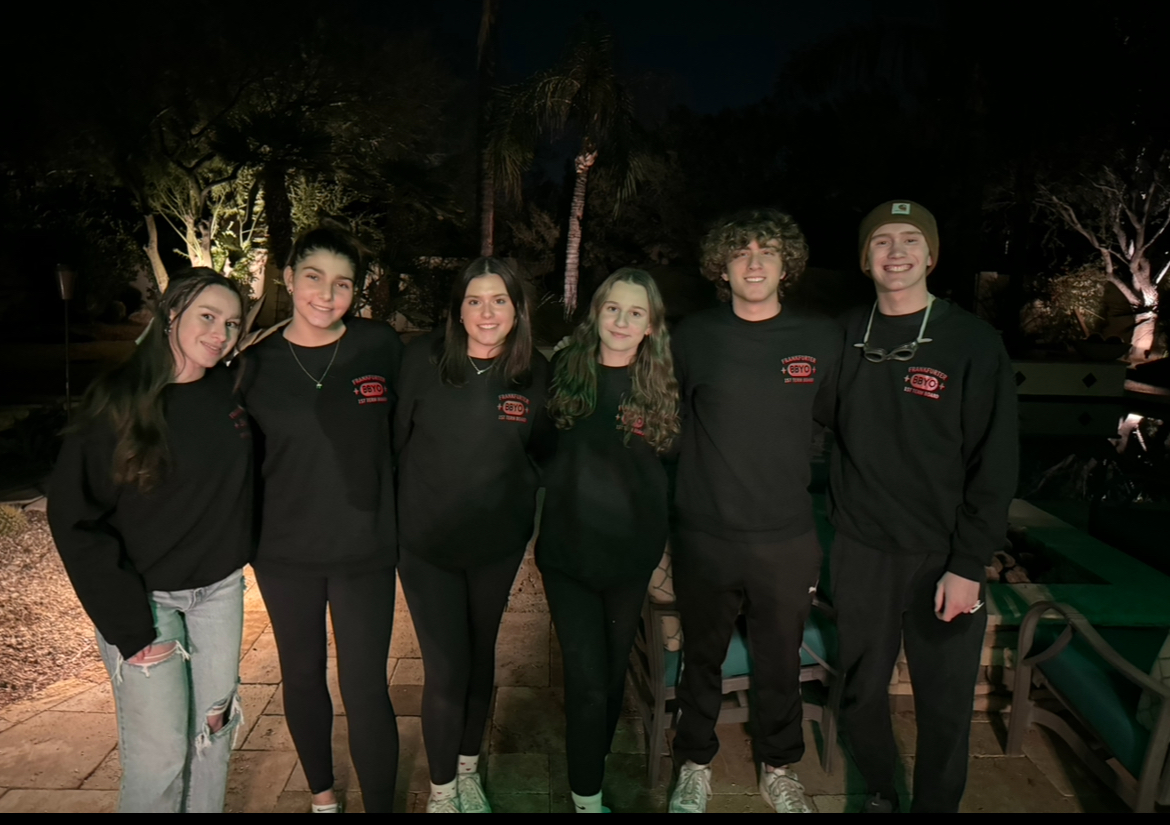 Group of people celebrating on stage