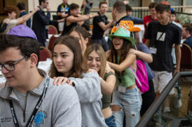 Group of people celebrating on stage
