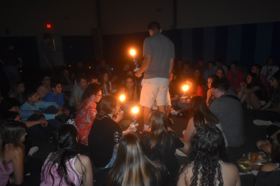 Group of people celebrating on stage