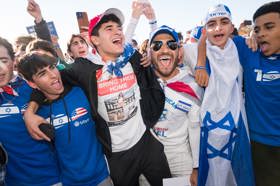 Group of people celebrating on stage
