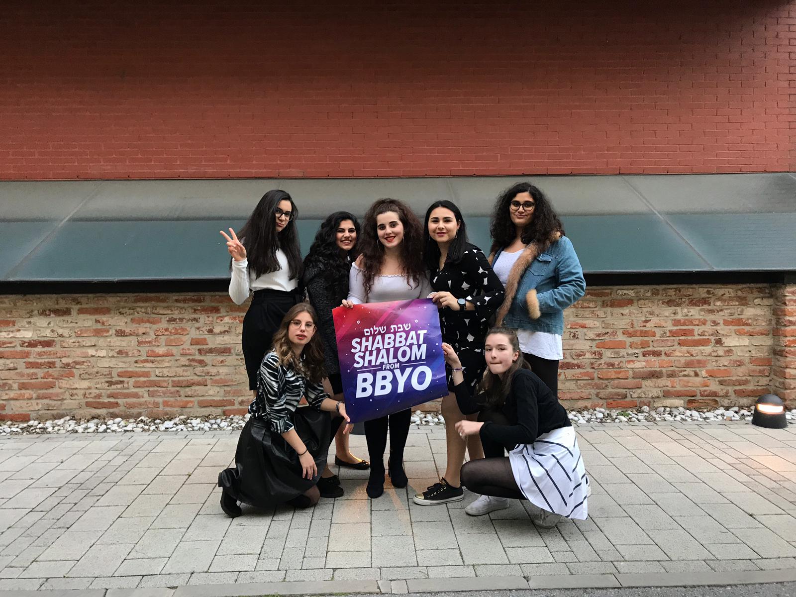 Group of people celebrating on stage