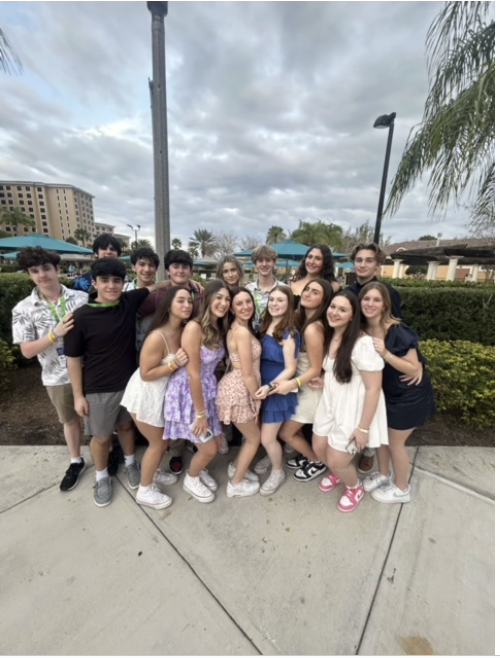 Group of people celebrating on stage