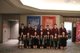 Group of people celebrating on stage