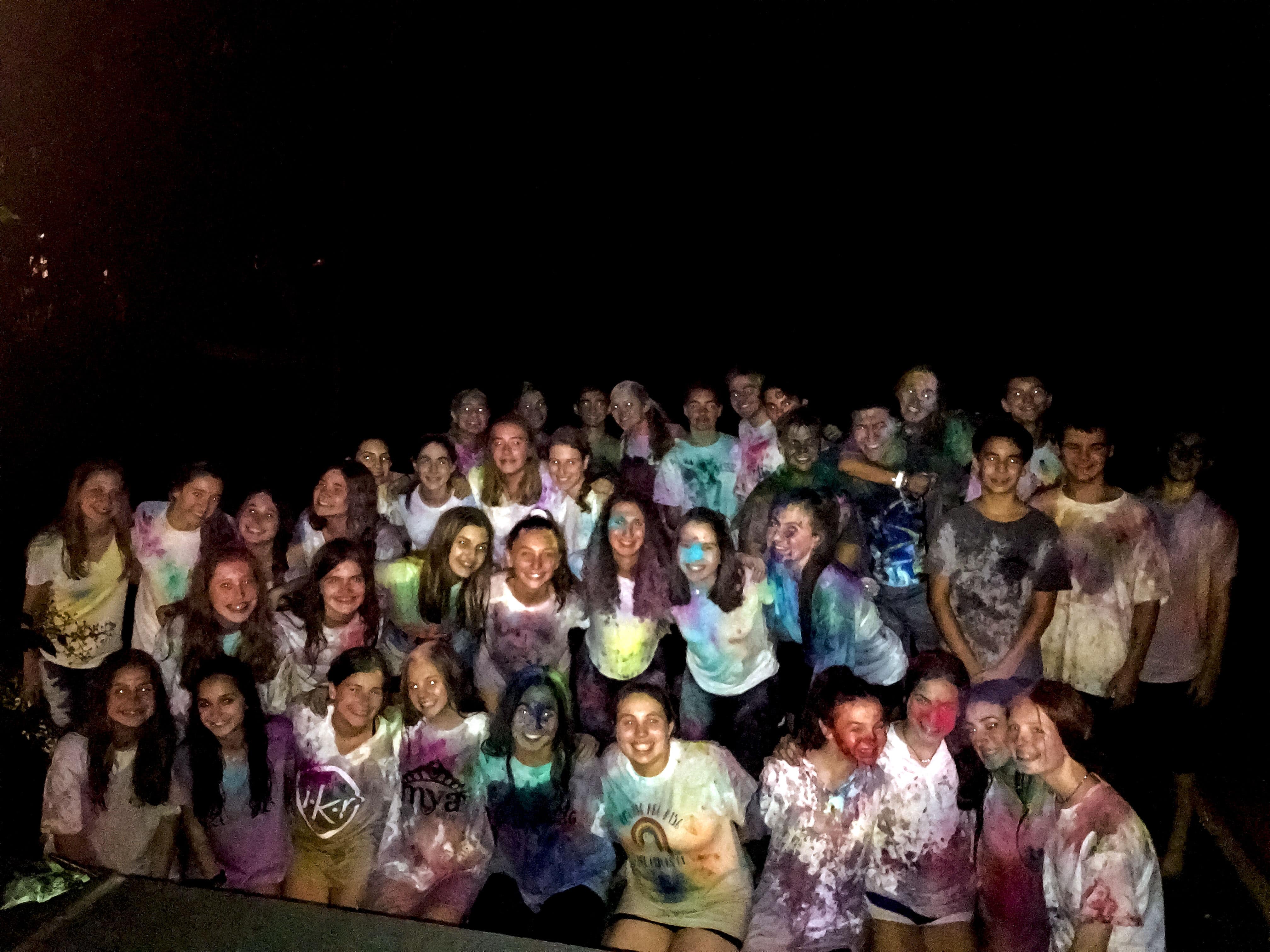 Group of people celebrating on stage