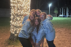 Group of people celebrating on stage