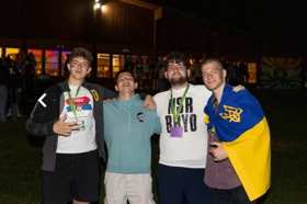 Group of people celebrating on stage