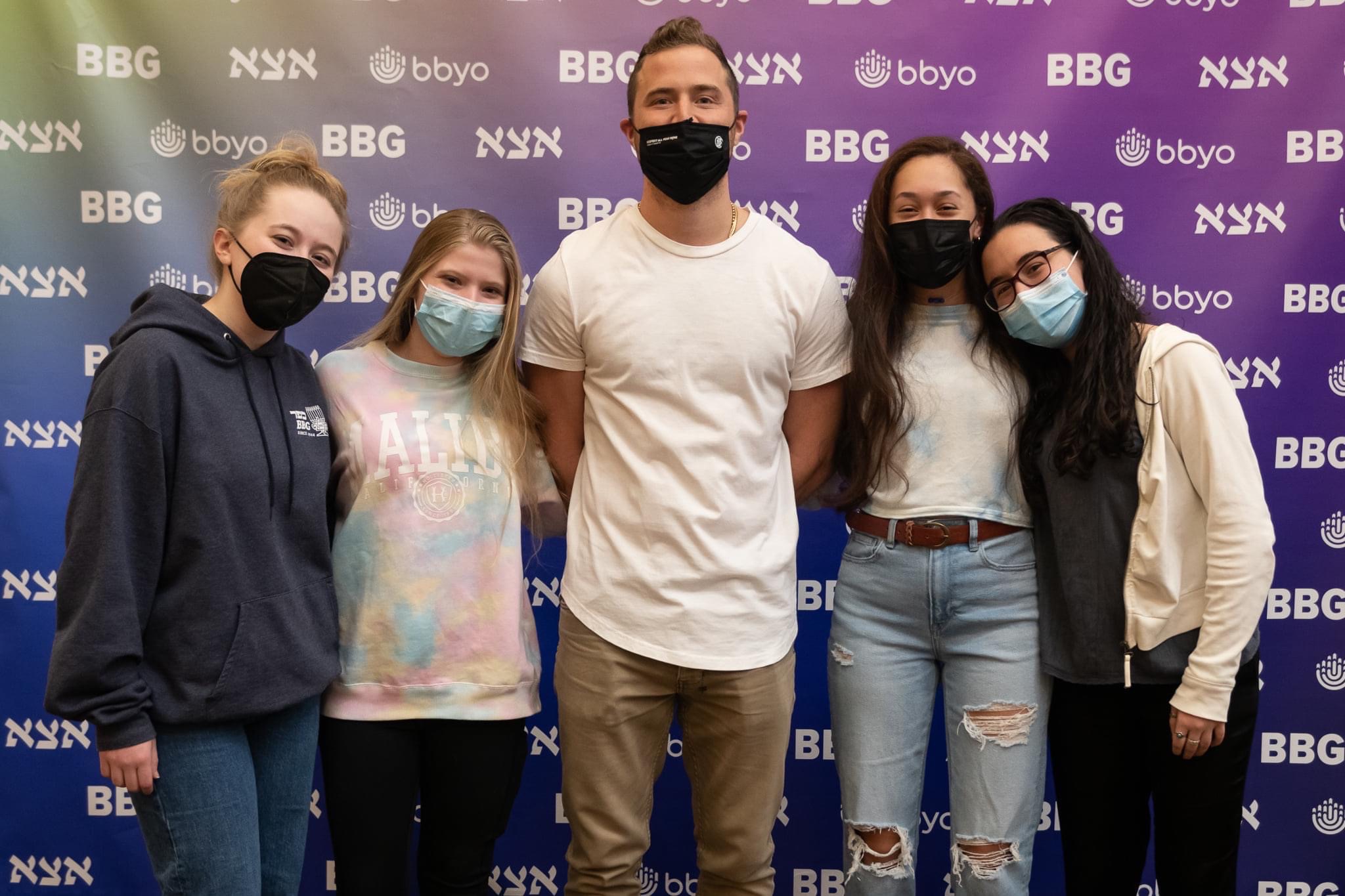 Group of people celebrating on stage