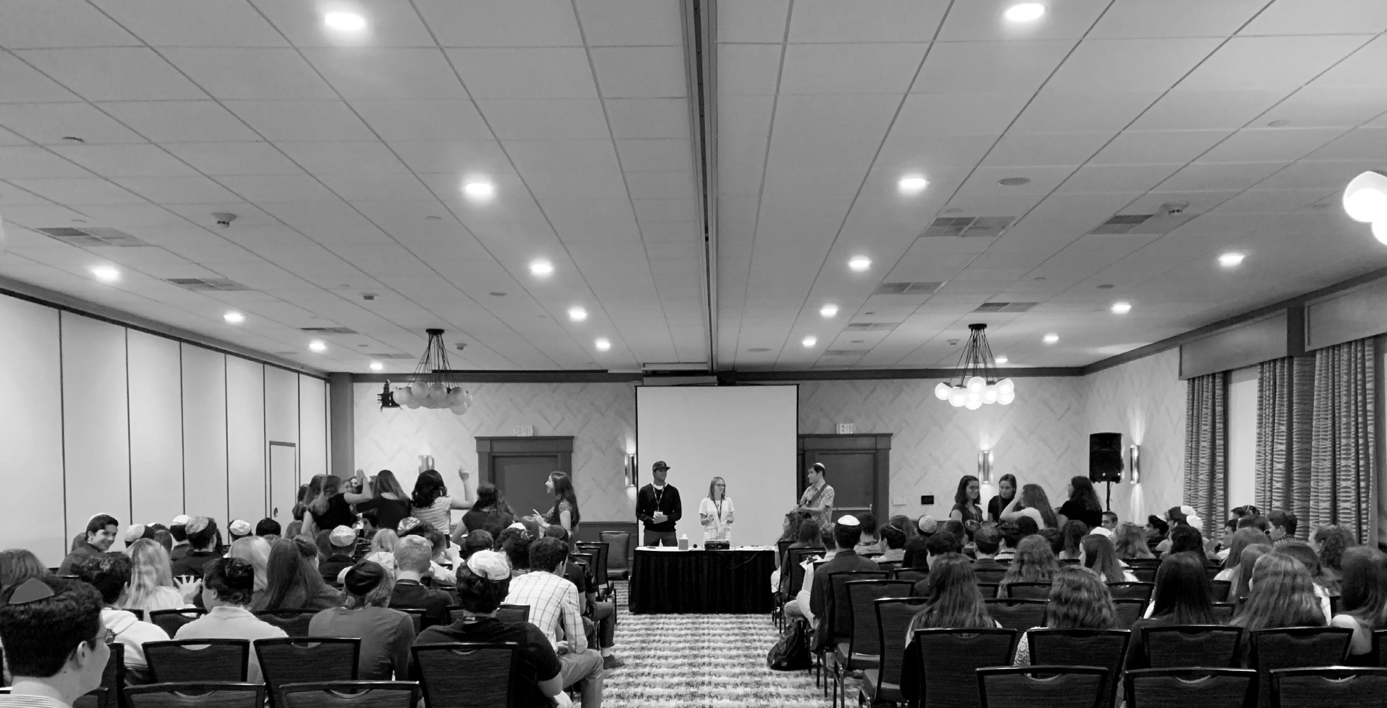Group of people celebrating on stage