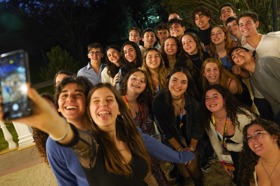 Group of people celebrating on stage