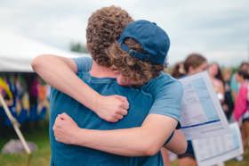 Group of people celebrating on stage