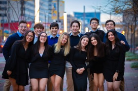 Group of people celebrating on stage