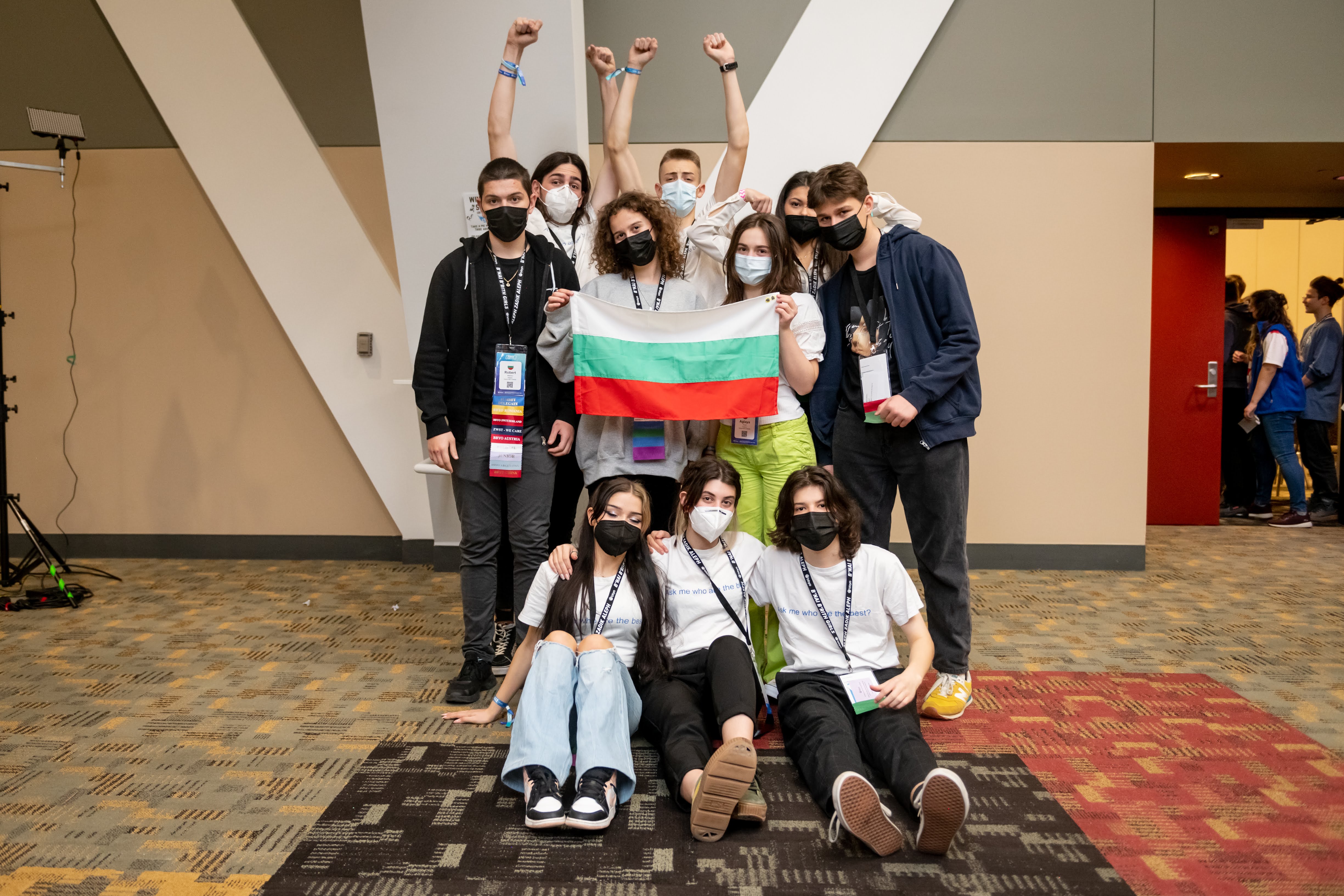 Group of people celebrating on stage