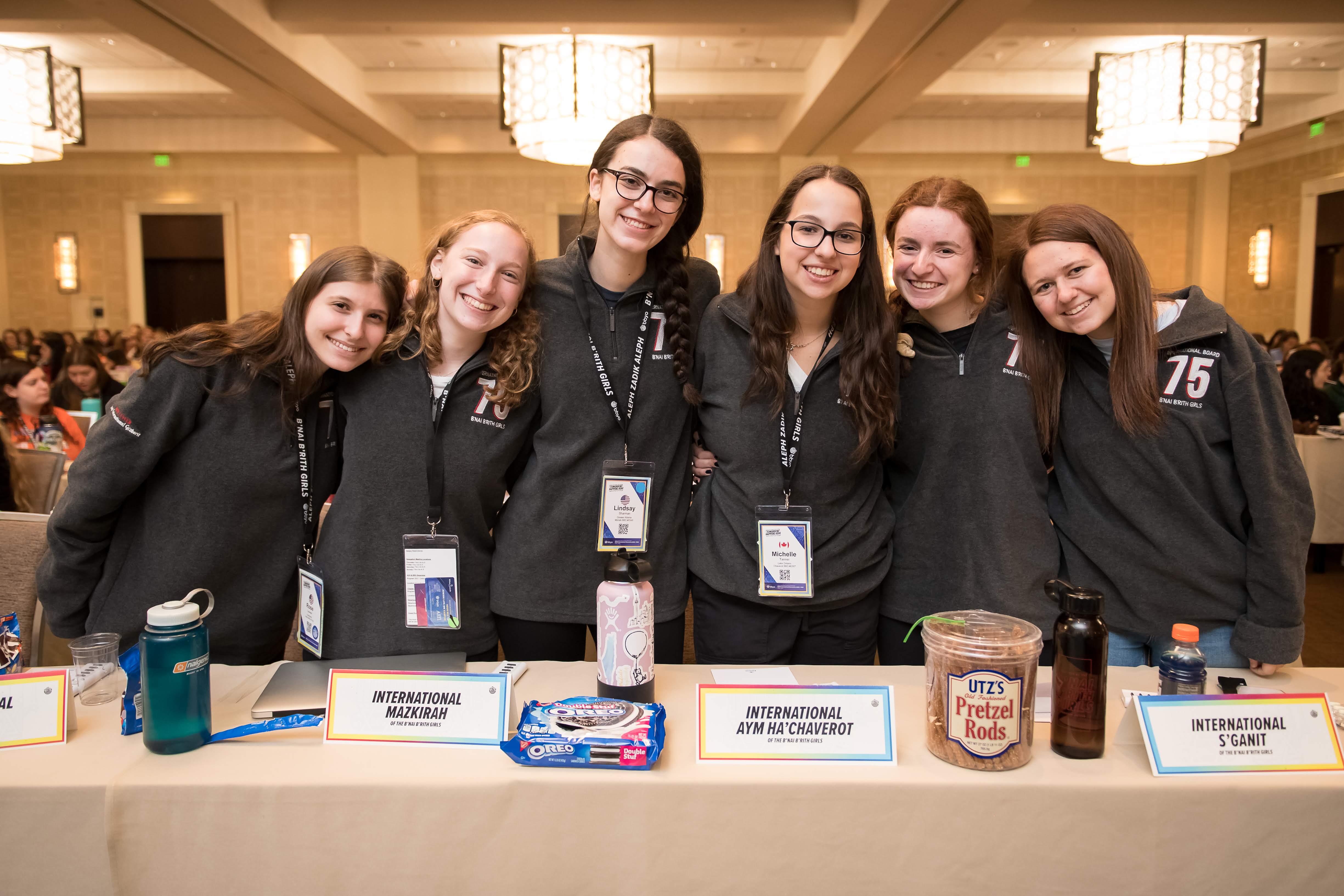 Group of people celebrating on stage