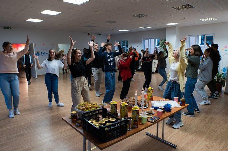 Group of people celebrating on stage