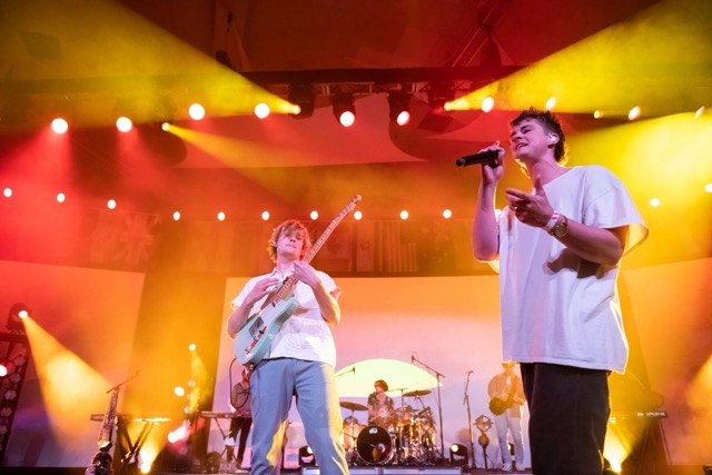 Group of people celebrating on stage