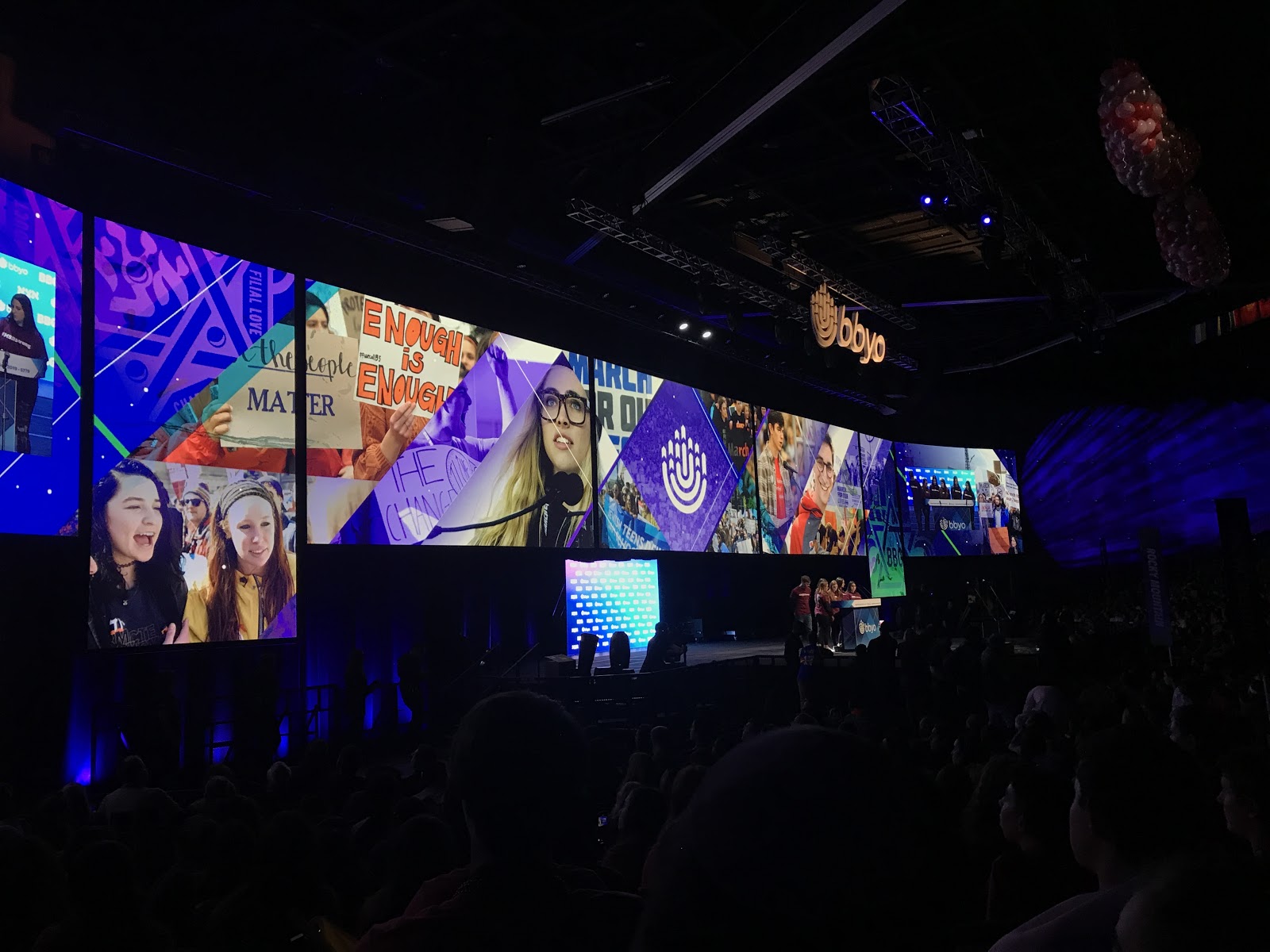 Group of people celebrating on stage