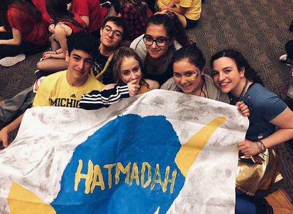 Group of people celebrating on stage