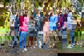 Group of people celebrating on stage