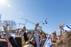 Group of people celebrating on stage