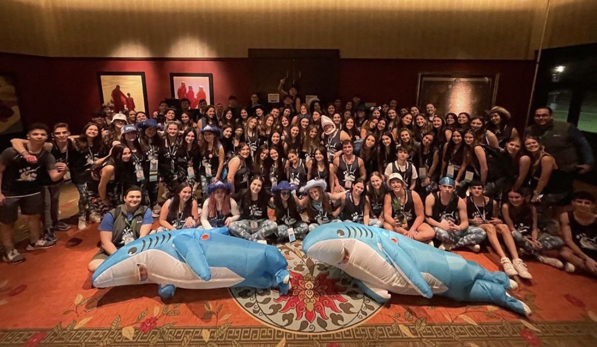 Group of people celebrating on stage