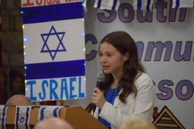 Group of people celebrating on stage