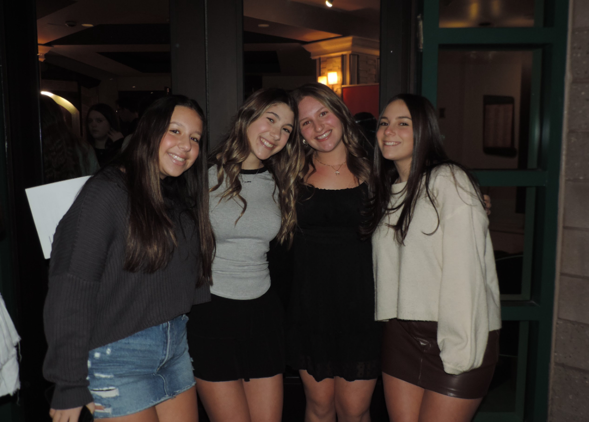 Group of people celebrating on stage