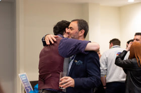 Group of people celebrating on stage