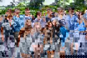 Group of people celebrating on stage