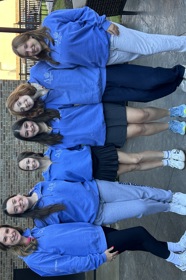 Group of people celebrating on stage