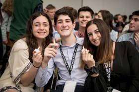 Group of people celebrating on stage