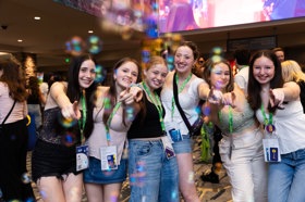 Group of people celebrating on stage