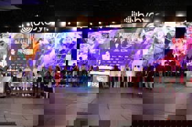 Group of people celebrating on stage