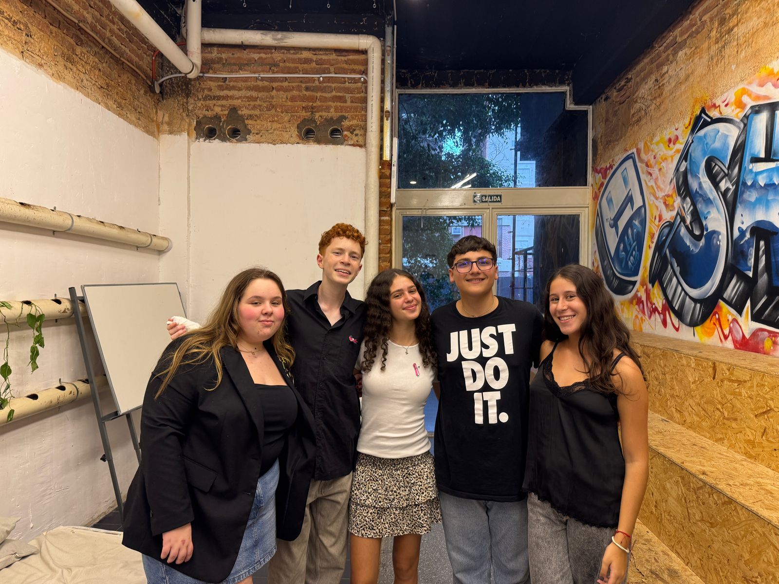 Group of people celebrating on stage