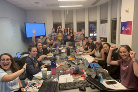 Group of people celebrating on stage