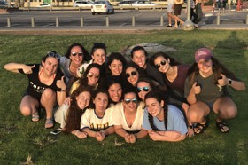 Group of people celebrating on stage