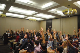 Group of people celebrating on stage