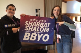 Group of people celebrating on stage