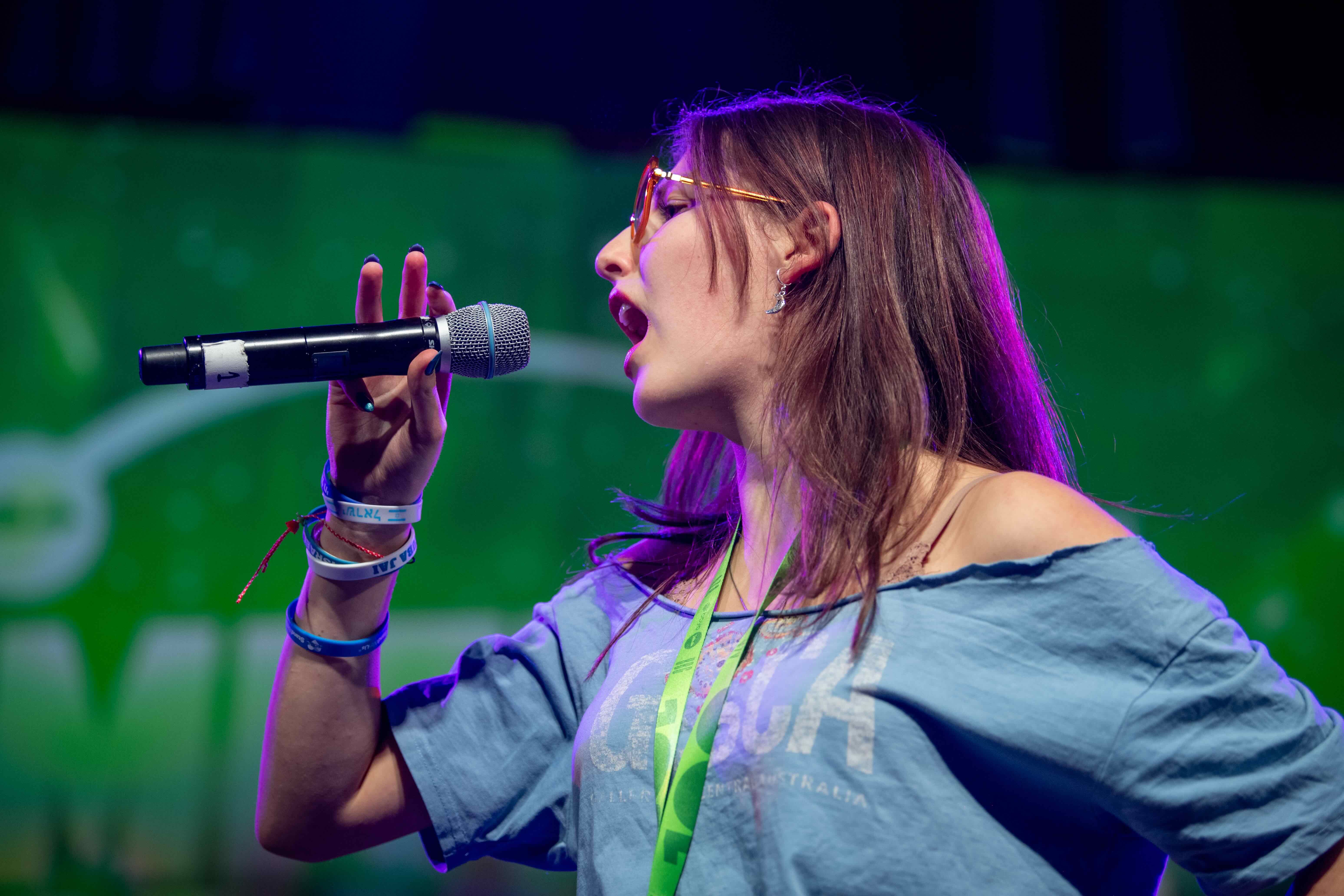 Group of people celebrating on stage