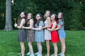 Group of people celebrating on stage