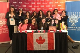 Group of people celebrating on stage