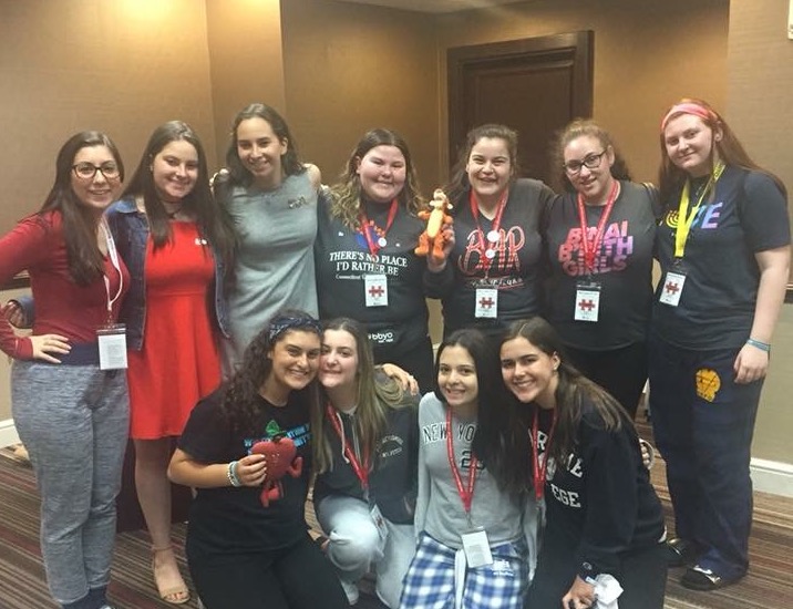 Group of people celebrating on stage