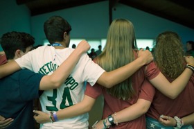 Group of people celebrating on stage